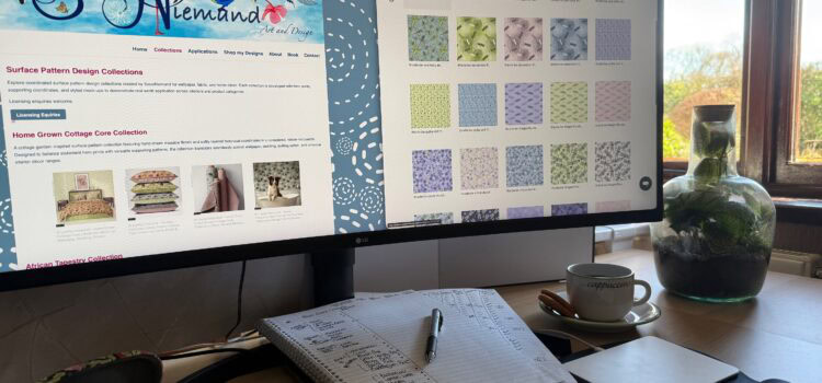 Studio workspace of Lisette Niemand showing her website and Spoonflower collections during a creative organisation and website restructure session.