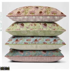 Four stacked scatter cushions featuring coordinated botanical designs from the Home Grown Cottage Core Collection by Lisette Niemand.
