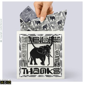 Stationery 1 Thank you gift bag design by Lisette Niemand featuring African Animal Silhouette Elephant from the African Animal Silhouettes Collection, shown with coordinating tissue paper. Features a bold black elephant silhouette framed by hand-drawn African-inspired geometric patterns, with “Big Thanks” integrated into the design.