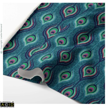 Fabric Designs 2 Fabric design by Lisette Niemand called Peacock Indulgence from the Bohemian Spirit Collection, shown in a folded fabric mock-up. Features repeating peacock feather motifs in teal, green, and magenta tones with a textured background.