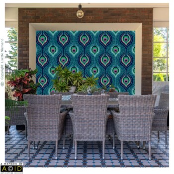 WallPaper Designs 2 Wallpaper design by Lisette Niemand called Peacock Indulgence from the Bohemian Spirit Collection, shown as a feature wall in a styled interior mock-up. Features stylised peacock feather motifs in teal, emerald, and magenta tones arranged in a repeating Art Deco style geometric pattern.