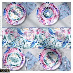 Dining table setting featuring Kaleidoscope Pond Life mosaic plates, dragonfly motif tableware and coordinated table runner by Lisette Niemand.