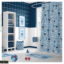 Children’s bathroom interior with shower curtain featuring Seaside Nauti Gull Sailors navy blue pattern by Lisette Niemand from the Seaside Shenanigans collection.